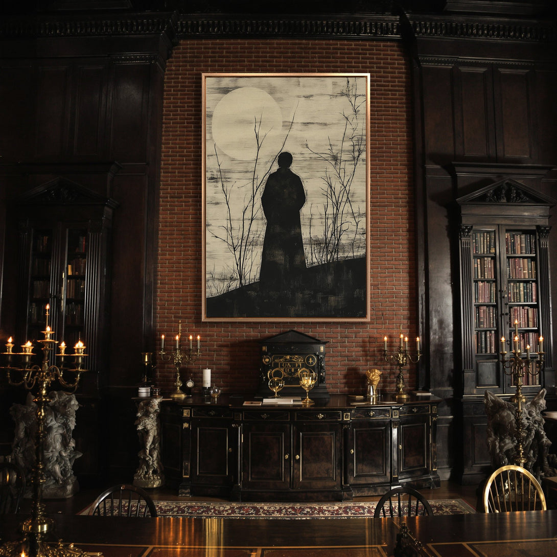 Framed Wall Art featuring a silhouette in a minimalist style, displayed in a dark, moody interior. Black and white artwork with a touch of gold.