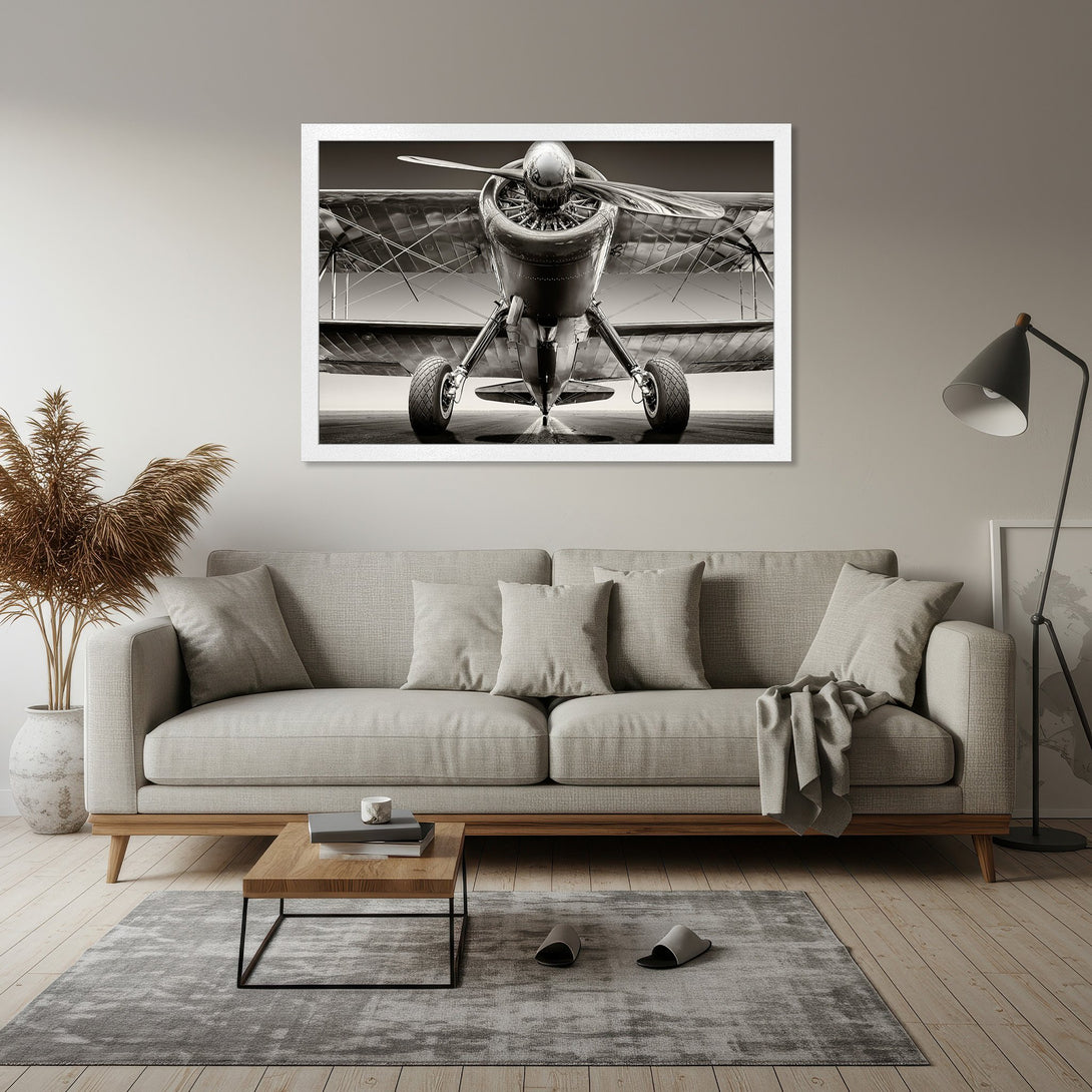 Framed Poster of vintage airplane in monochrome, perfect for aviation enthusiasts. Neutral color palette complements any decor.