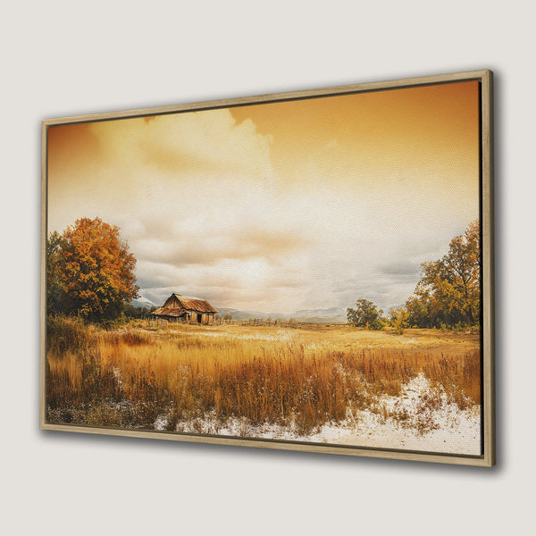 Framed Wall Art: Rustic landscape Canvas Print with warm, autumnal tones. Featuring a barn and field, perfect for adding cozy charm to your home.