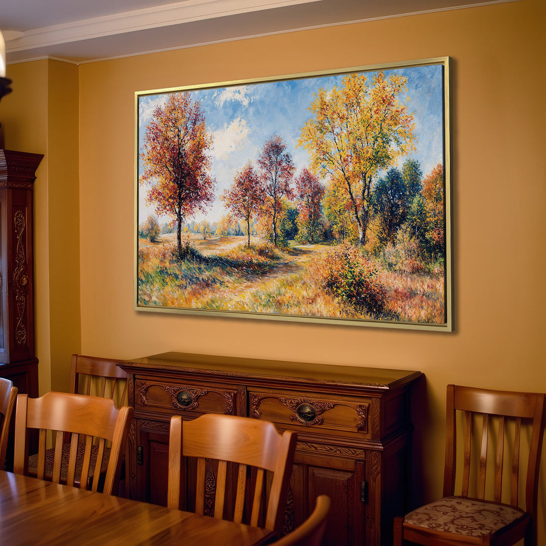 Canvas Print of an autumn landscape painting in warm yellows, oranges, and blues, perfect for adding a touch of nature to your living room.