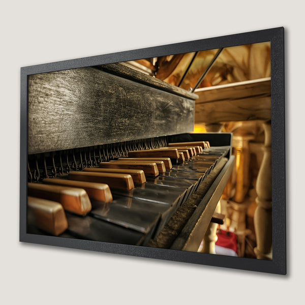 Framed Poster of an antique piano keyboard. Vintage style with warm brown and black tones. Perfect wall art for music lovers.
