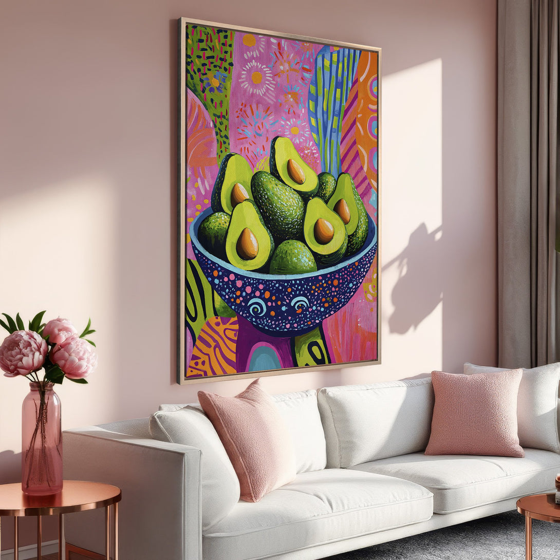 Framed Wall Art: Colorful avocado painting in a modern, abstract style. Vibrant pink, green, and blue hues brighten any space. Perfect for kitchen or dining room decor.