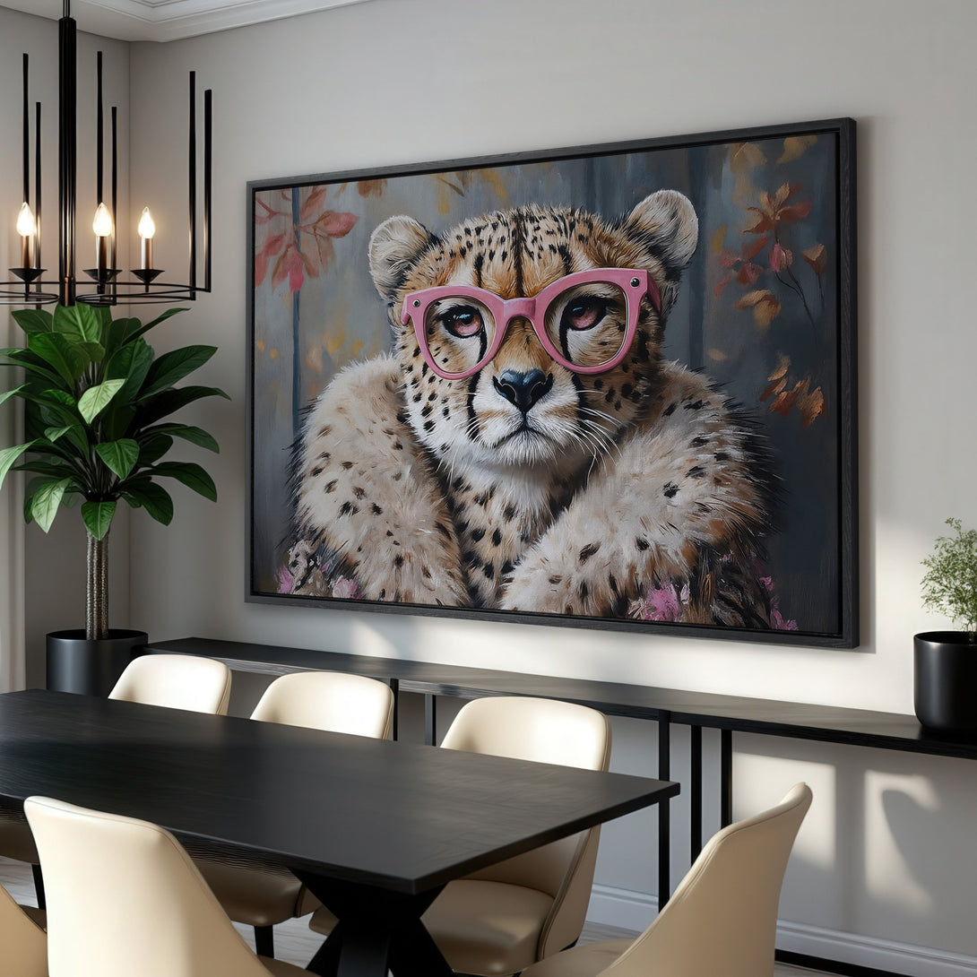 Framed Wall Art: Playful cheetah portrait with pink glasses. Stylish artwork in neutral and pink tones, perfect for modern home decor.