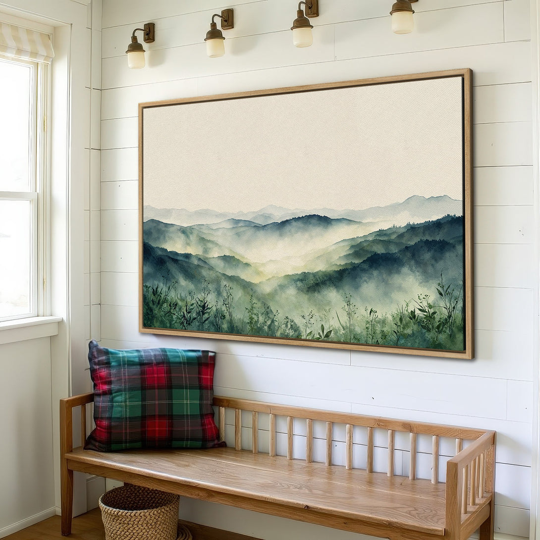 Framed Wall Art featuring a watercolor landscape of misty mountains in shades of blue and green. Perfect for adding a touch of nature to your home decor.