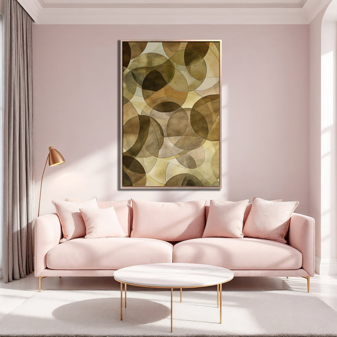 Framed Wall Art featuring abstract geometric circles in warm brown and gold tones. Adds a touch of modern elegance to any living room. Shop now!