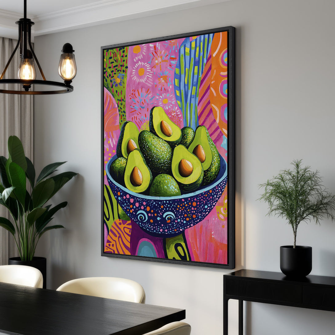 Framed Wall Art featuring vibrant avocado painting. Modern, colorful abstract style with pink, green, and orange hues. Perfect kitchen or dining room decor.