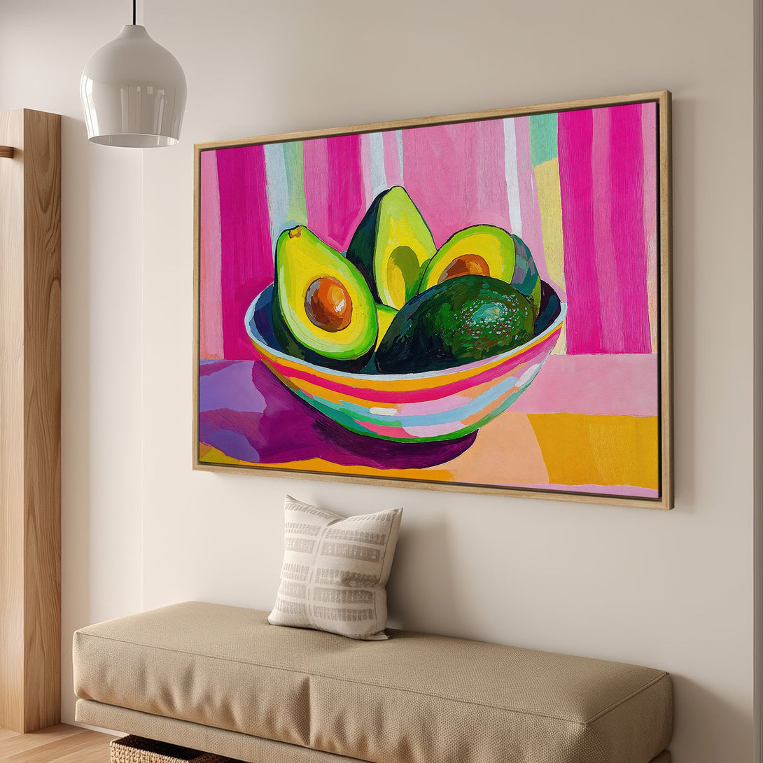 Framed Wall Art: Vibrant avocado painting with a pink and yellow color palette. Modern art for kitchen or dining room decor.