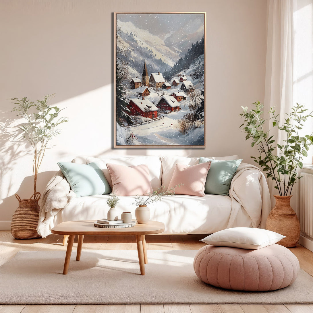Framed Wall Art of a snowy village scene in a cozy interior. Features a warm, neutral color palette with pops of red and blue, perfect for adding charm.