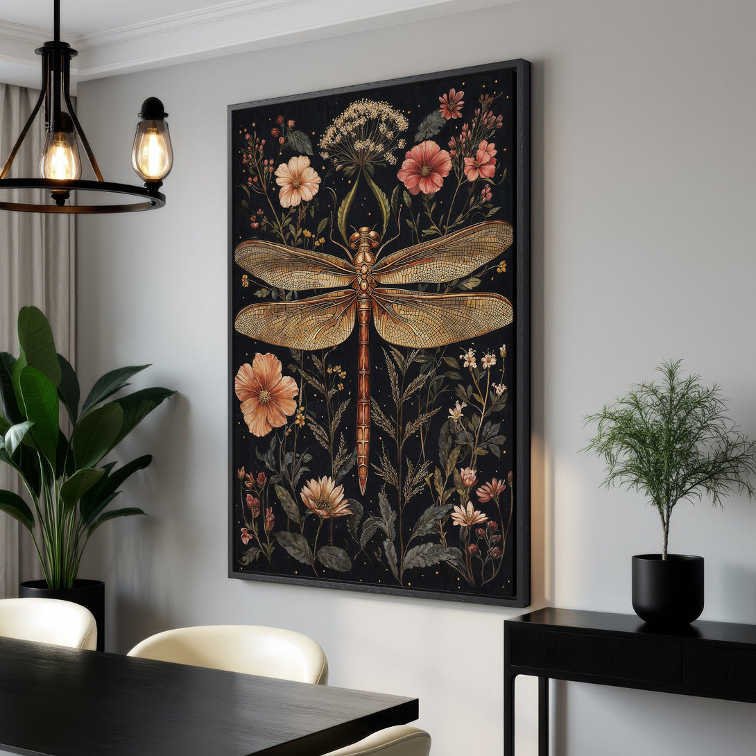 Framed Wall Art featuring a detailed dragonfly and floral design on a black background. Warm, earthy color palette. Perfect for adding a touch of nature to your space.