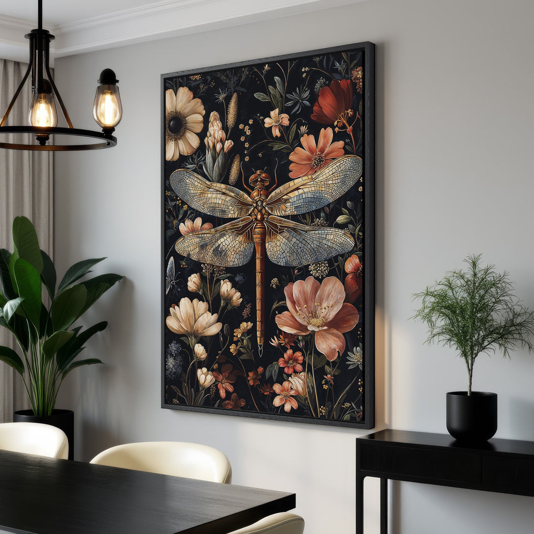 Framed Wall Art featuring a dragonfly and flowers. Dark, moody floral design with warm, earthy tones. Perfect for adding a touch of nature to your home decor.