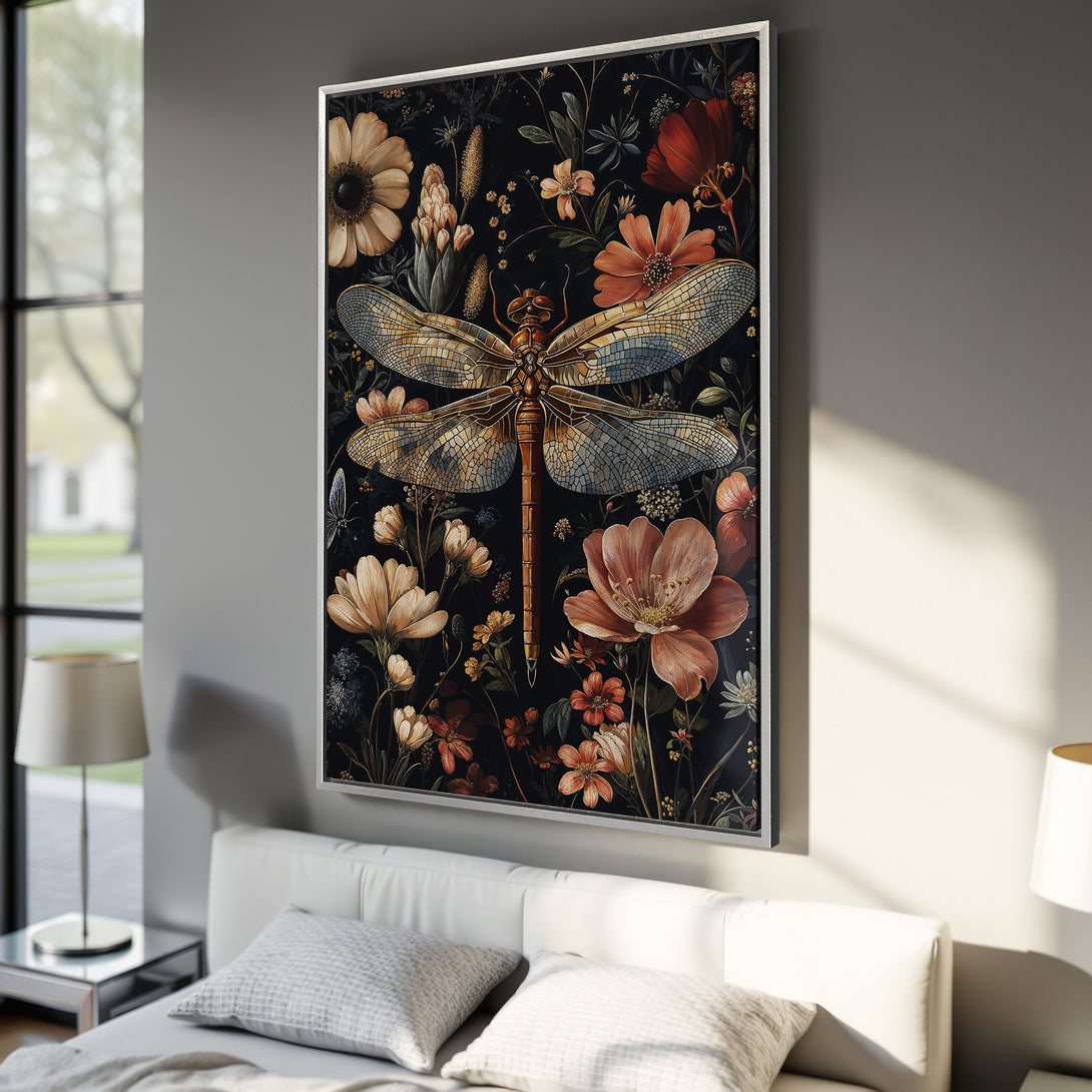Framed Wall Art featuring a dragonfly amidst floral elements. Dark, moody color palette with warm orange and beige tones. Perfect for adding a touch of nature.