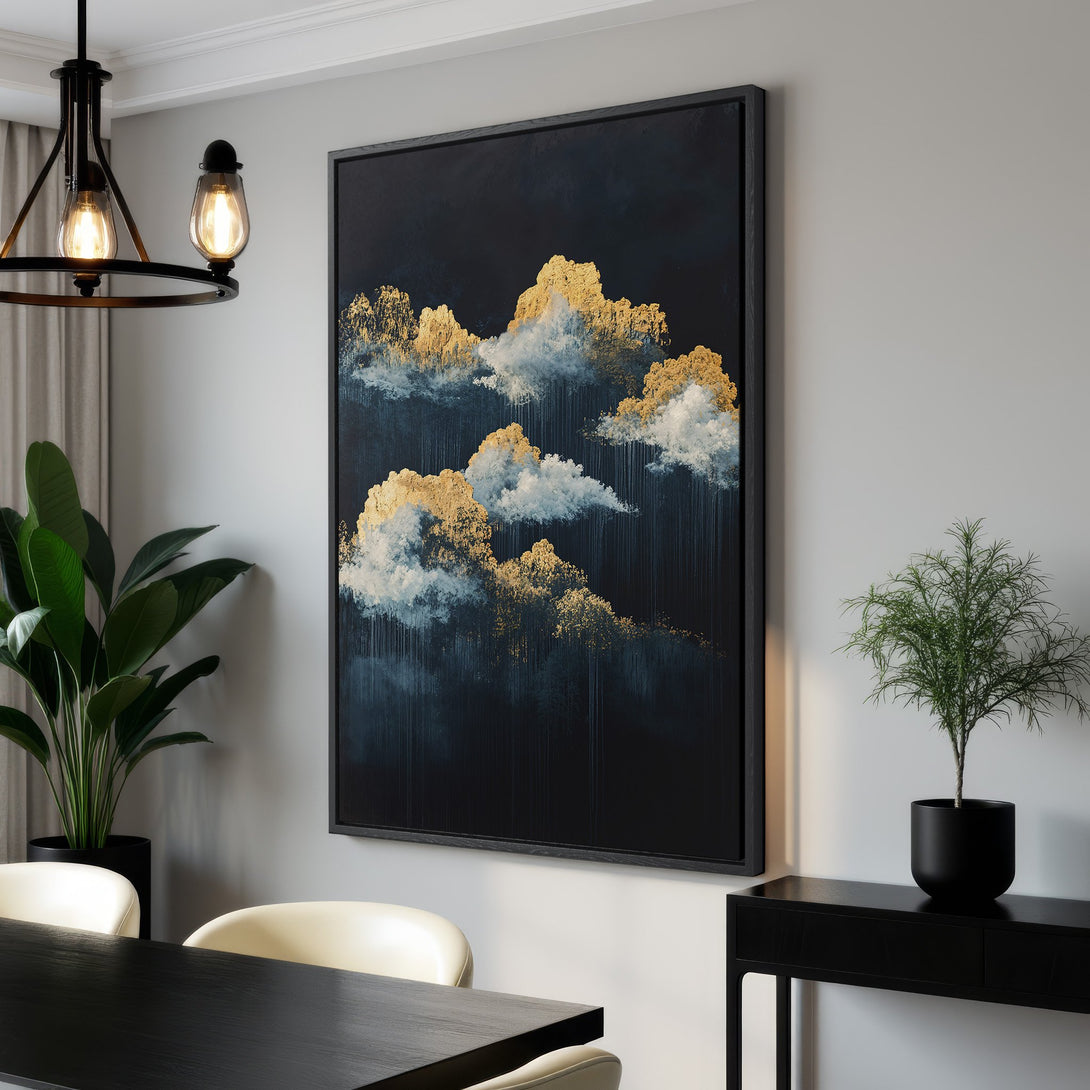 Framed Wall Art Canvas Print featuring abstract gold cloud painting on a dark blue background. Modern art in a minimalist interior, perfect for home decor.
