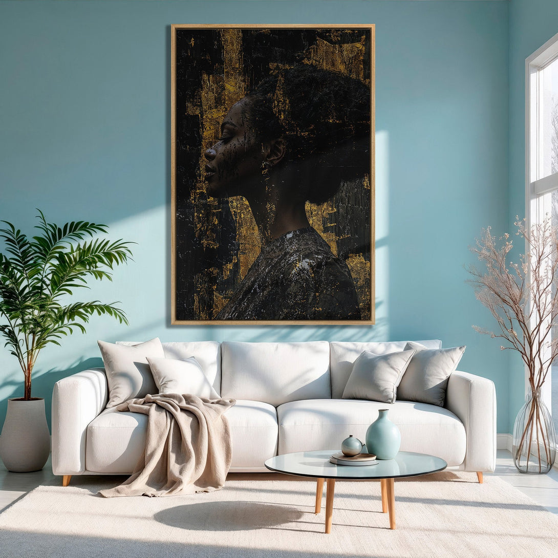 Framed Wall Art: Abstract portrait in black & gold, displayed in a modern living room with a blue and neutral color palette. Elevate your space!