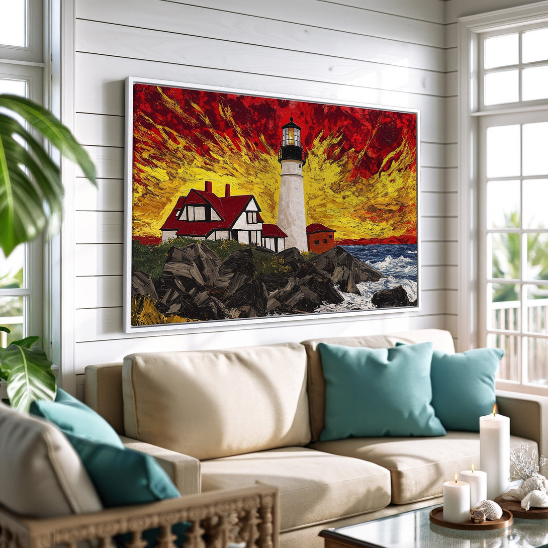 Framed Wall Art featuring a lighthouse painting with a vibrant red and yellow sky. Coastal-inspired art in a living room setting.