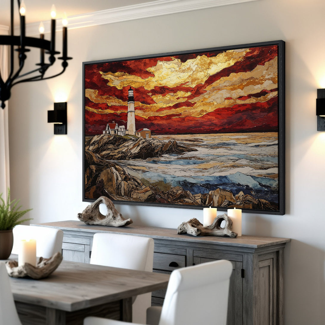 Framed Wall Art: Lighthouse painting with fiery red and gold sunset. Coastal landscape art in a dining room setting. Enhance your home decor!