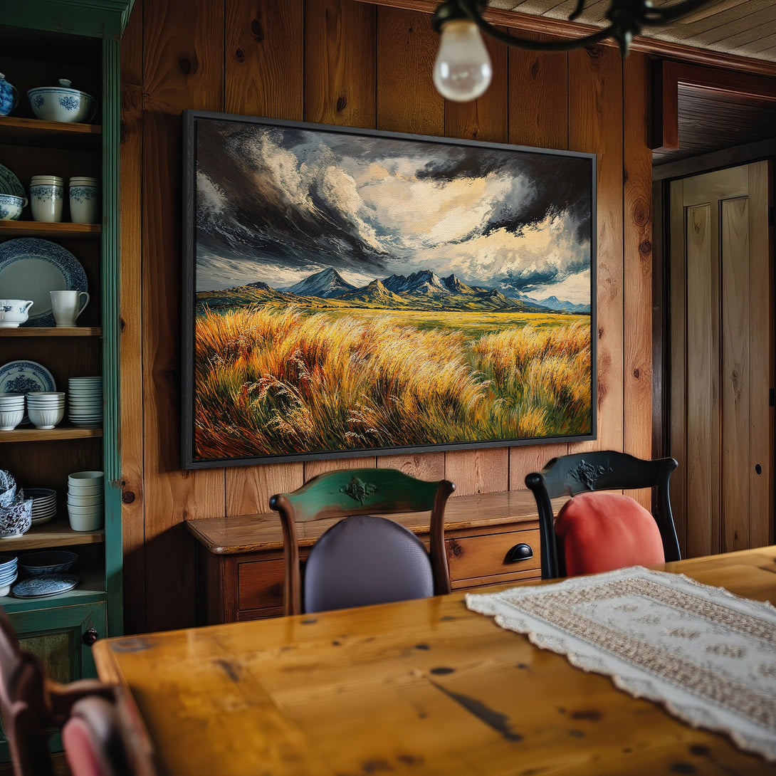 Framed Wall Art: Landscape Canvas Print with moody sky, mountains, & golden field. Earthy tones create a cozy, rustic interior design. Shop now!