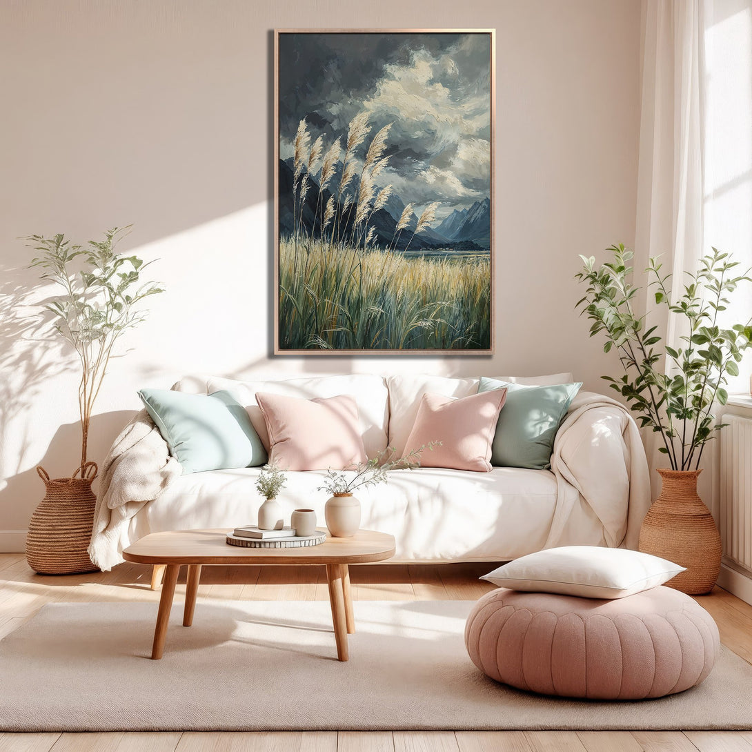 Framed Wall Art featuring a serene landscape painting in a neutral color palette, displayed in a cozy, modern living room setting.