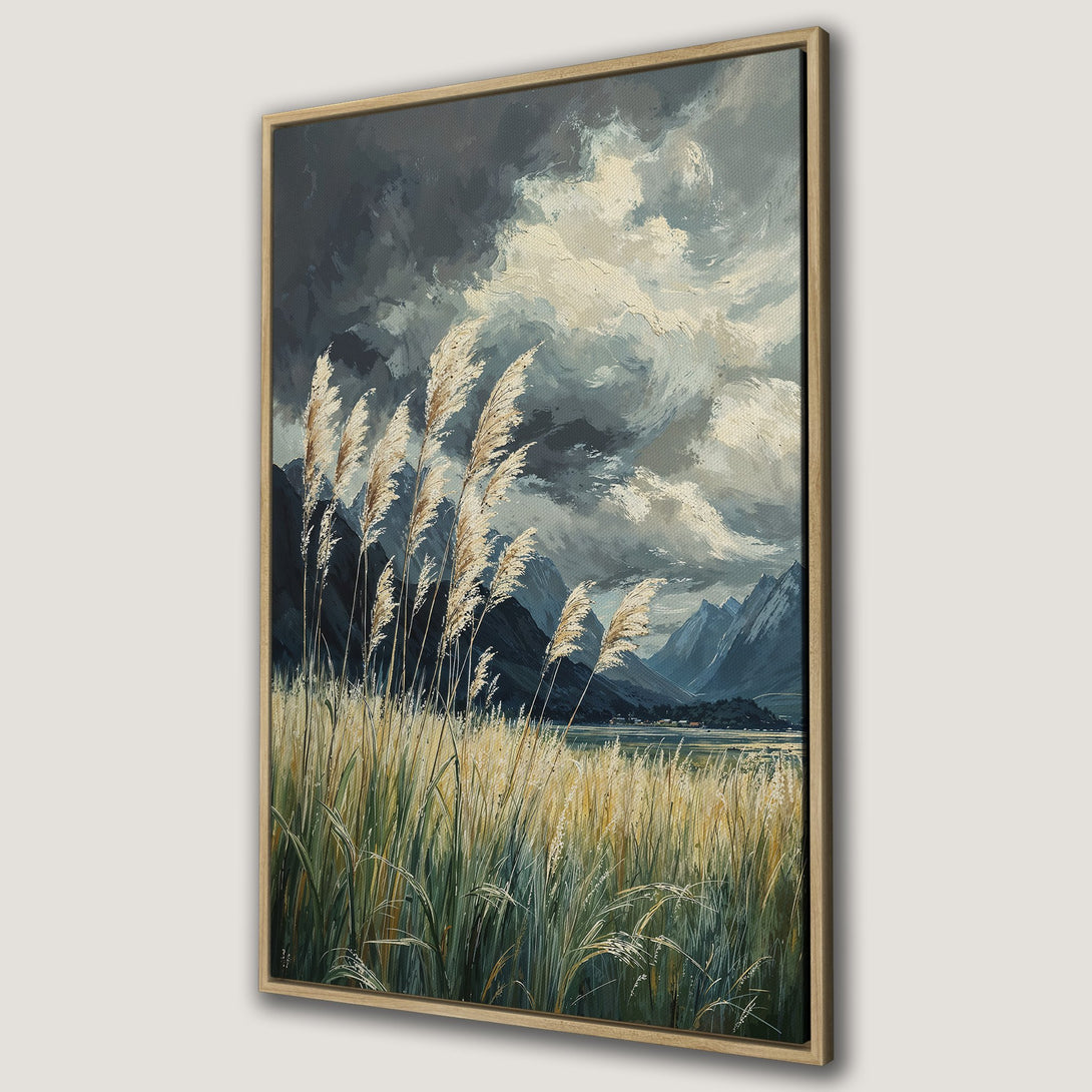 Framed Wall Art Canvas Print of a serene landscape with tall grass, mountains, and a moody sky in a cool, muted color palette.