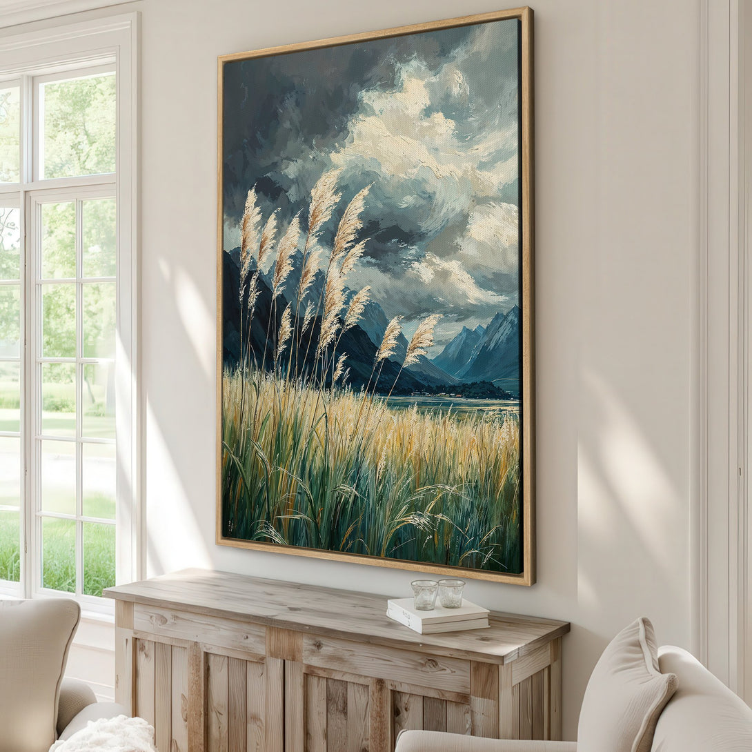 Framed Wall Art featuring a moody landscape with reeds and mountains, in a cool blue and gold palette. Elevate your space with this stunning canvas print.