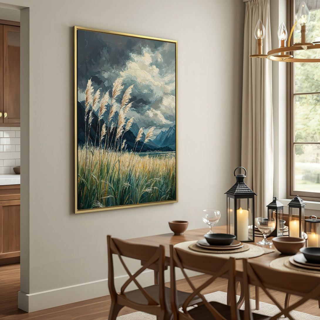 Canvas Print: Dramatic landscape art with moody sky, tall grass, and mountains. Earthy tones create a calming, rustic aesthetic for your home.