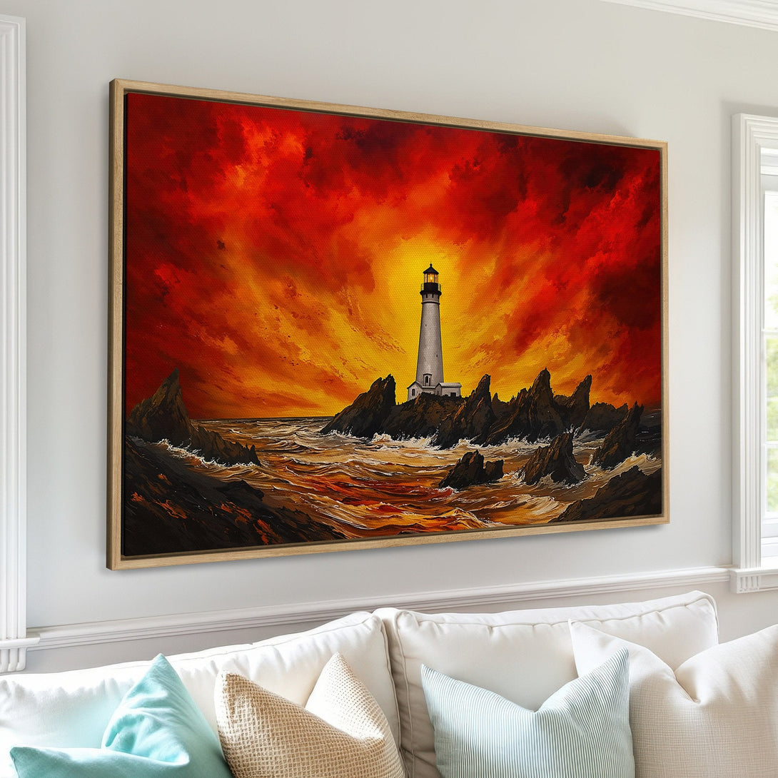 Framed Wall Art: Dramatic lighthouse painting with fiery red, orange, and yellow sunset. Coastal art in a warm, inviting color palette. Perfect for living room decor.