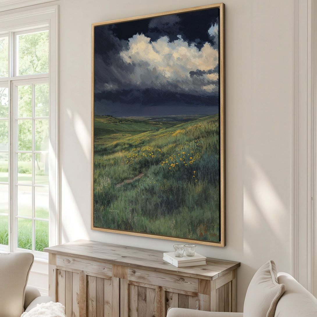 Framed Wall Art: Dramatic landscape canvas print featuring stormy sky & green fields. Earthy tones with pops of yellow. Perfect for adding a touch of nature to your home.