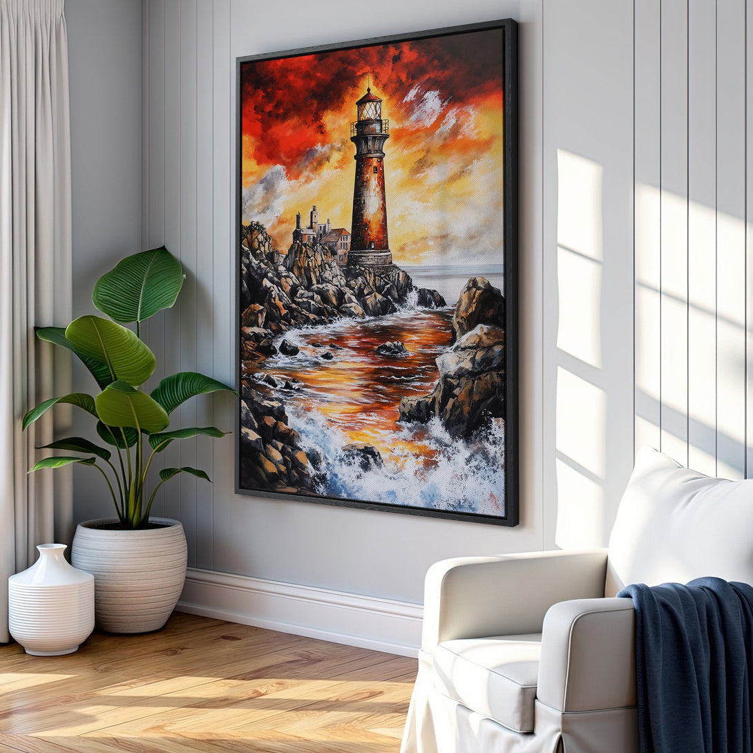 Framed Wall Art: Dramatic lighthouse painting with fiery orange and red sunset. Coastal art decor in a modern living room setting.