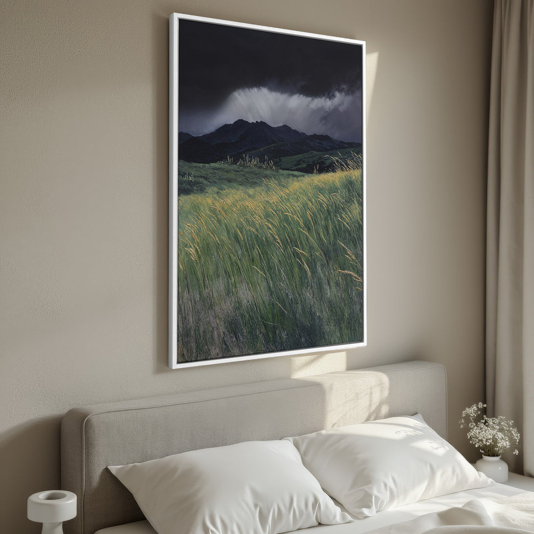 Framed Wall Art: Dramatic landscape Canvas Print with moody mountains and green fields. Earthy tones create a calming, nature-inspired aesthetic for your home.