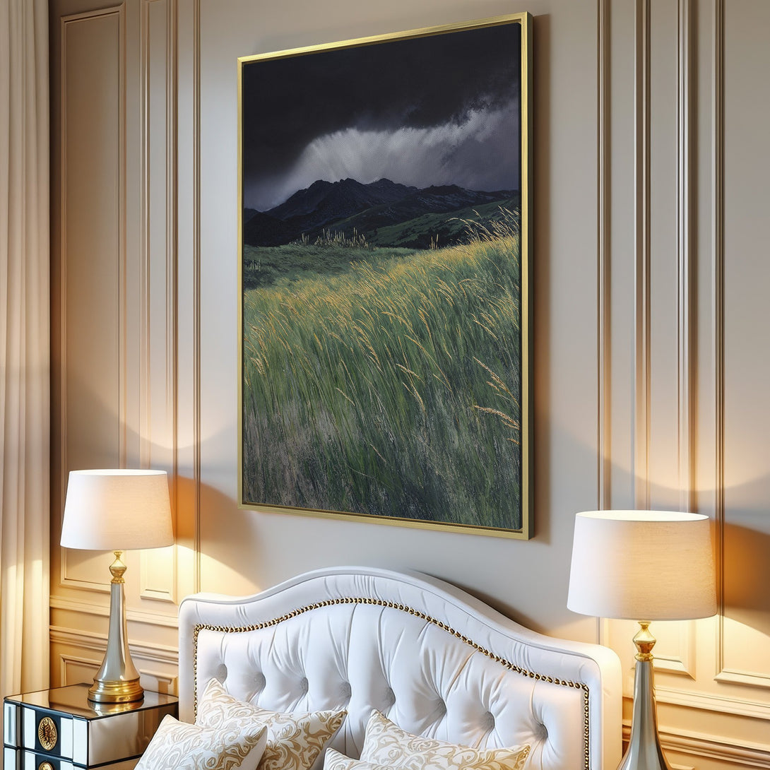 Canvas Print of a dramatic landscape with mountains, green fields, and stormy skies. Earthy tones create a calming, natural aesthetic.