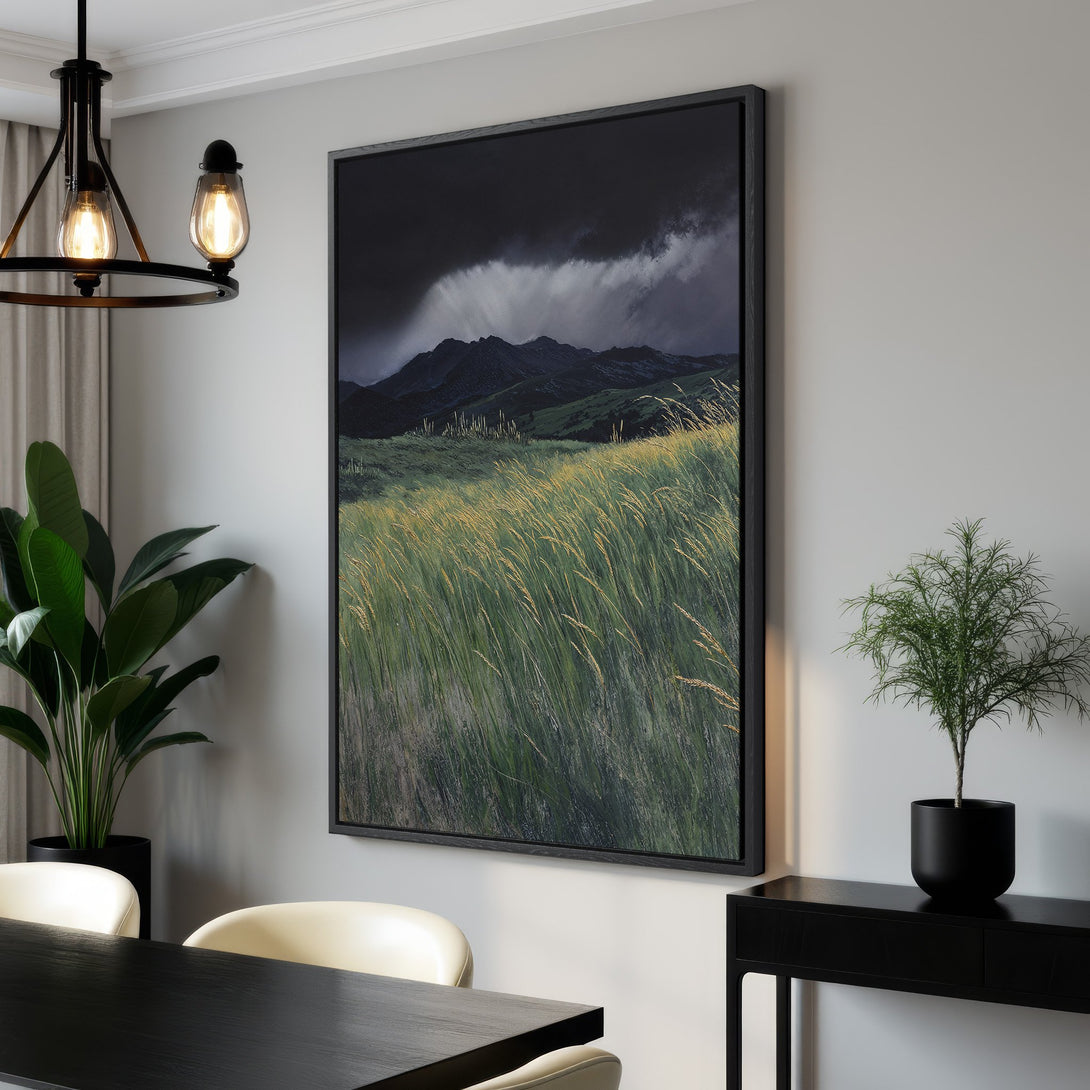Framed Wall Art featuring a landscape scene with mountains and tall grass, in a moody green and black color palette. Perfect for modern interior design.