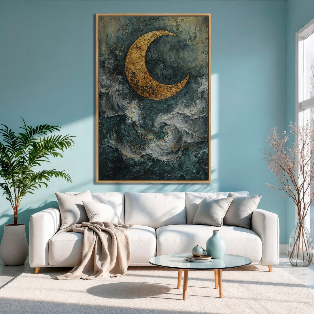 Framed Wall Art: Abstract moon over ocean canvas print. Moody, textured artwork in teal, gold, and gray tones. Perfect for living room decor.