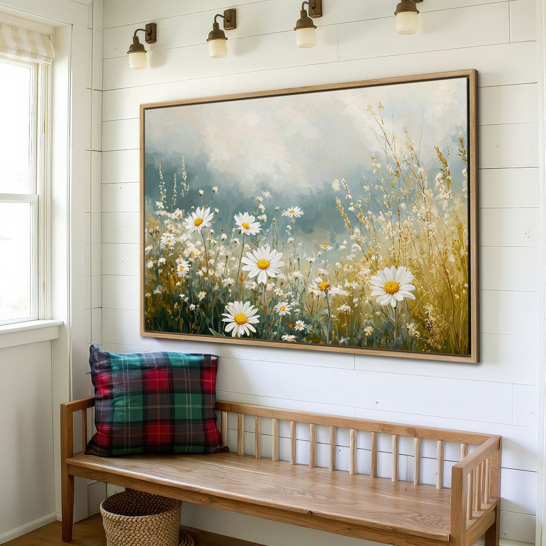 Canvas Print of daisies in a field, displayed in a cozy interior. Rustic style, with a soft blue, white, and gold color palette.