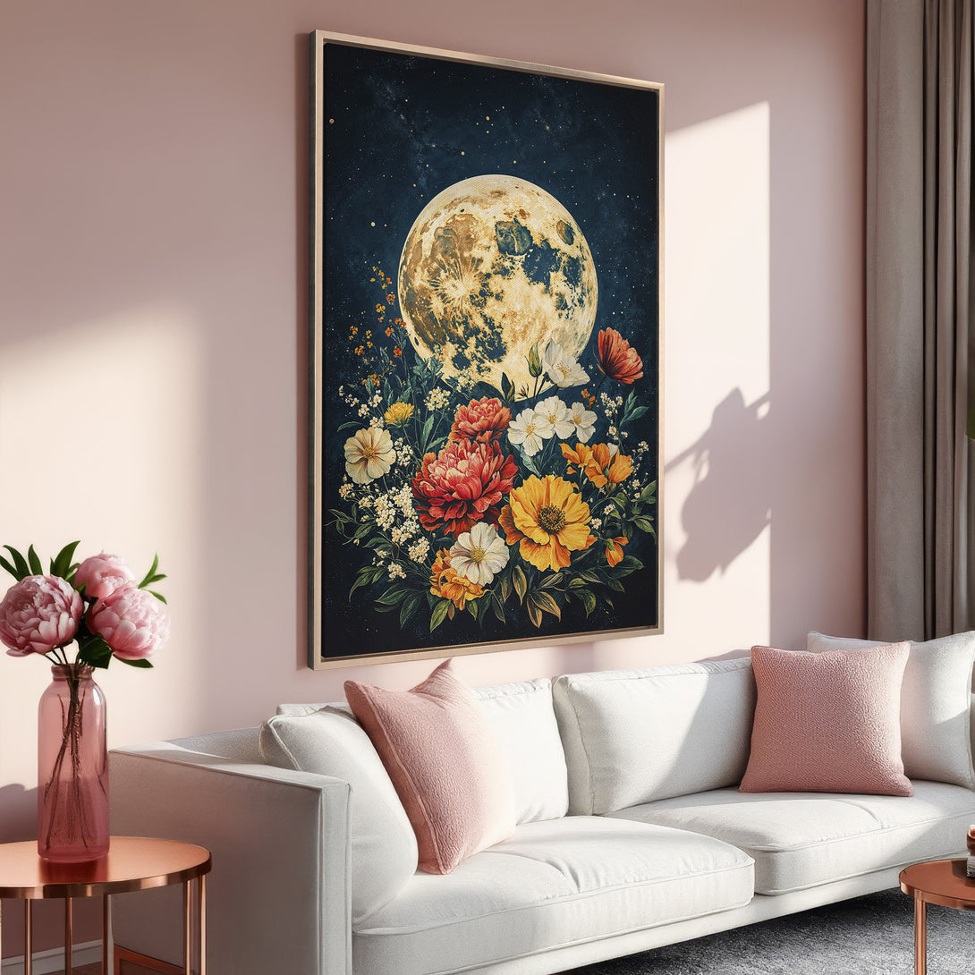 Framed Wall Art: Stunning moon & floral art print in a cozy interior. Features a dark blue background, warm yellow, red, and white flowers, and a gold frame.