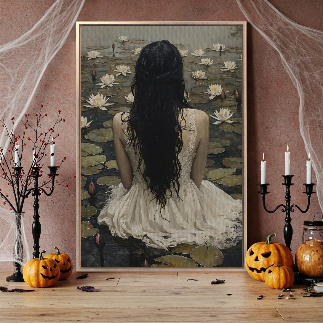 Framed Wall Art featuring a woman by a lake in a vintage style, with a muted color palette. Perfect for Halloween decor!