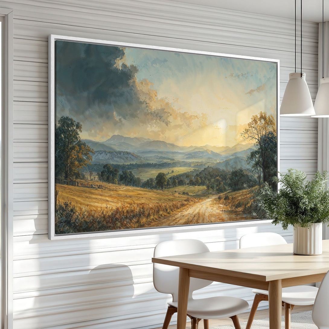 Framed Wall Art: Landscape Canvas Print with a warm, inviting color palette. Features a scenic countryside view with mountains and a dramatic sky. Perfect for any home!