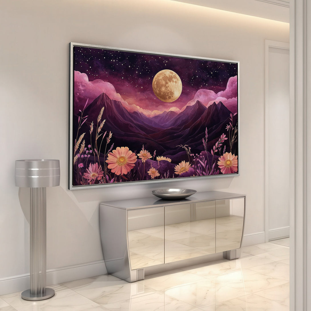 Framed Wall Art featuring a celestial landscape with mountains, flowers, and a moon. Dreamy style, with a purple and gold color palette. Perfect for home decor.