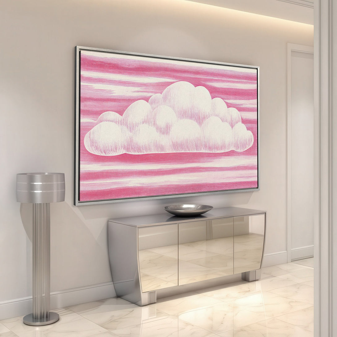 Framed Wall Art featuring a whimsical cloud design in pink and white. Modern art style perfect for adding a pop of color to your home decor.