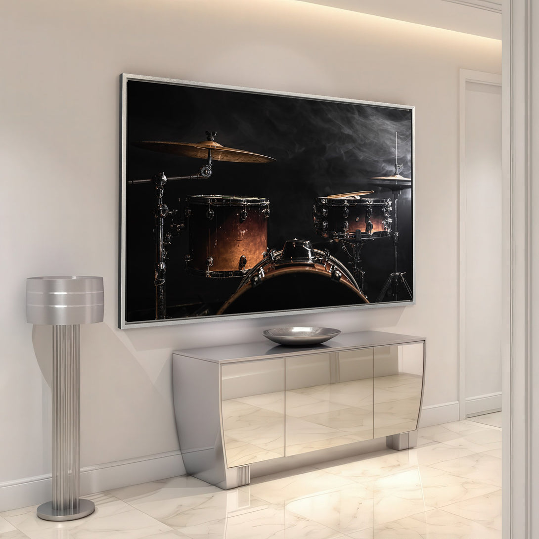 Framed Wall Art: Dramatic drum set canvas print in a modern interior. Dark, moody tones with warm highlights. Elevate your space with this stunning artwork.