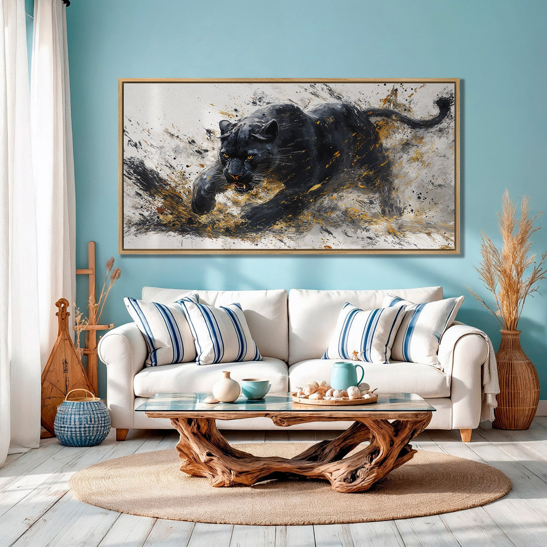 Framed Wall Art: Dynamic black panther painting with gold accents. Modern art in a living room with a blue and neutral color palette.