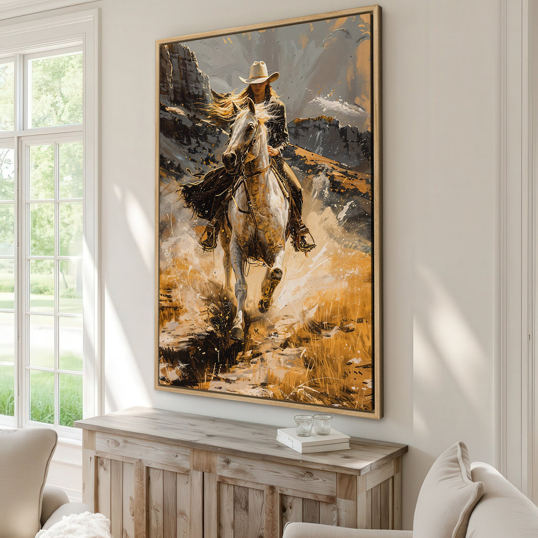 Framed Wall Art: Dynamic painting of a cowgirl on horseback in a desert landscape. Abstract style with a warm, earthy color palette. Perfect western decor!