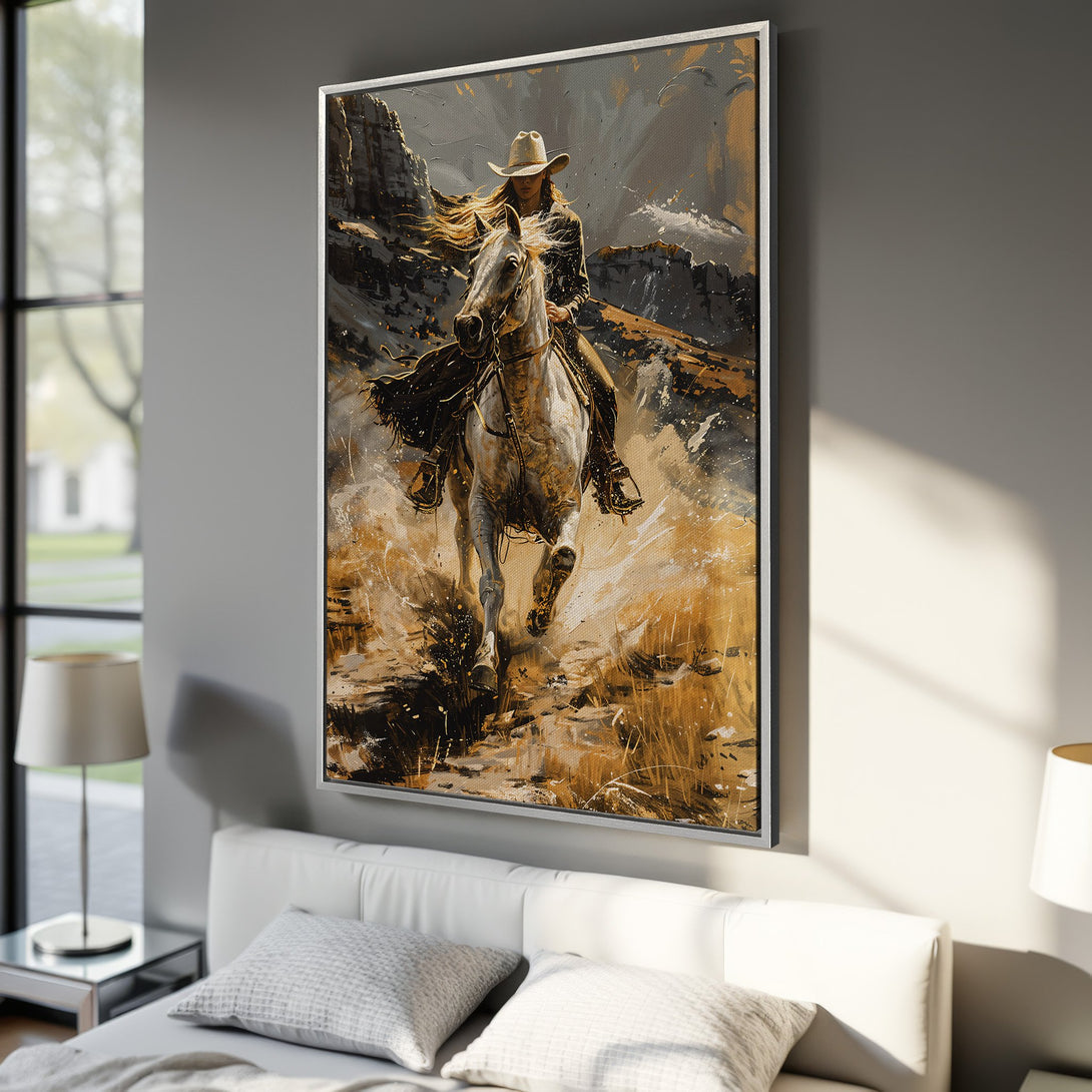 Framed Wall Art: Stunning painting of a cowgirl on horseback in a desert landscape. Features a warm, earthy color palette with gold and gray tones. Perfect for any space!