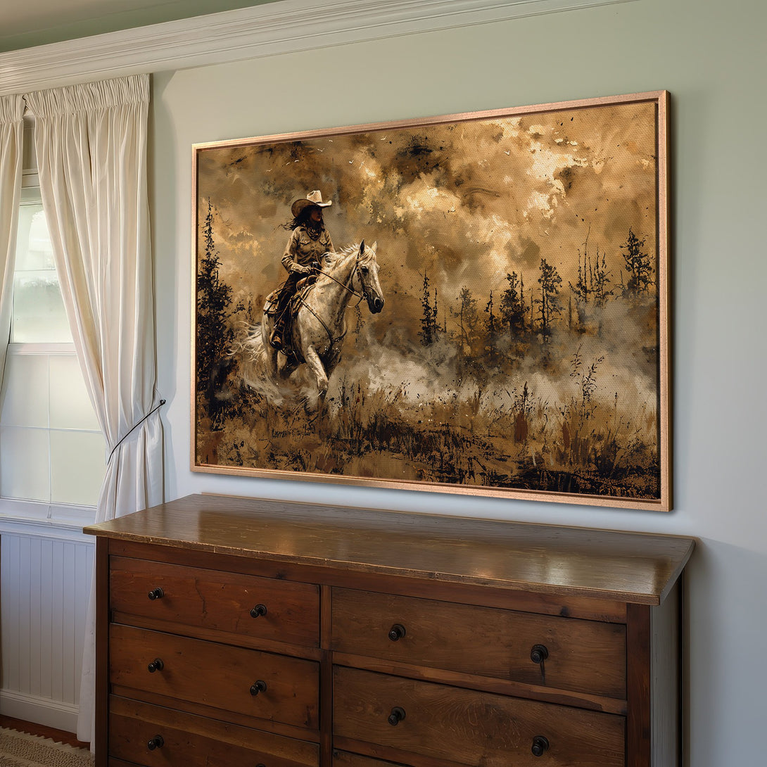 Framed Wall Art: Cowboy on horseback canvas print in warm earth tones. Rustic western art for home decor.