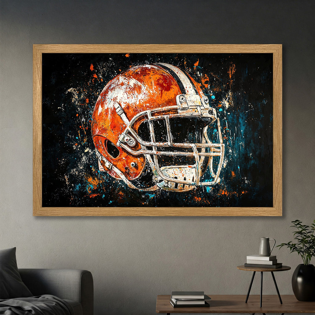 Framed Poster featuring a vibrant, abstract football helmet art print in orange, white, and blue on a dark background. Perfect wall decor!