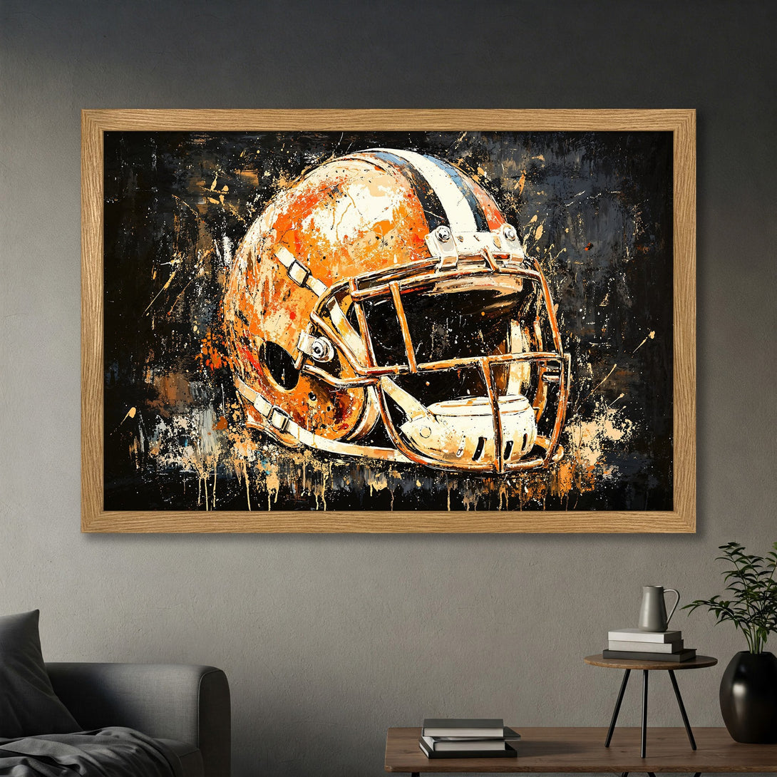 Framed Poster featuring an abstract football helmet art print. Bold orange and black color palette. Perfect sports decor.