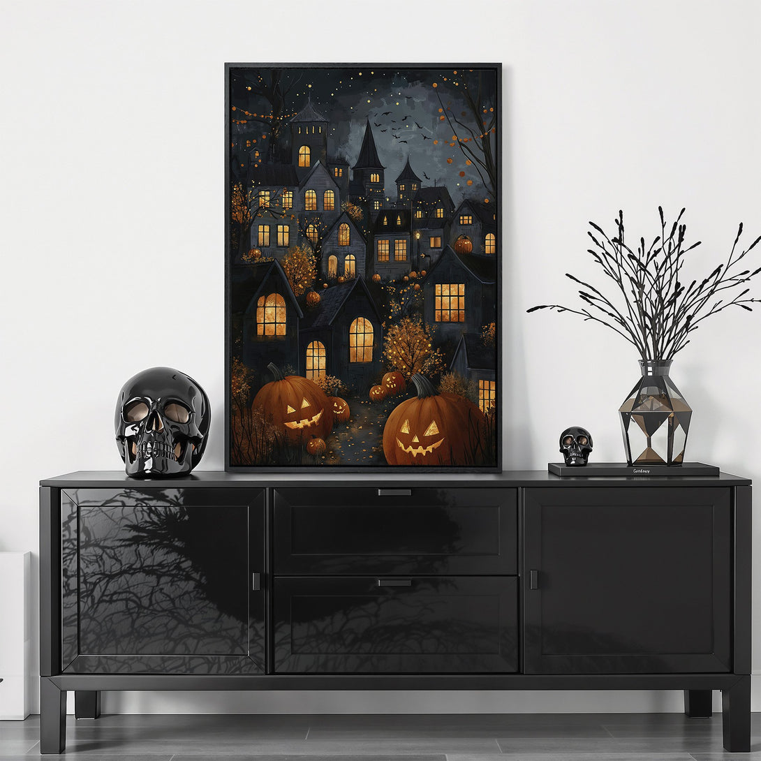 Framed Wall Art: Spooky Halloween town scene in dark blues and oranges. Perfect for fall decor, this canvas print adds a touch of eerie elegance.