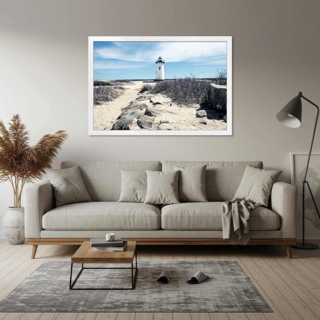 Framed Poster featuring a lighthouse on a sandy path, serene landscape art in neutral tones. Perfect coastal decor!