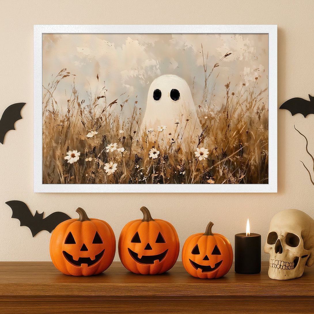 Framed Poster featuring a whimsical ghost in a field. Soft, neutral color palette with a touch of Halloween charm. Perfect for seasonal decor!