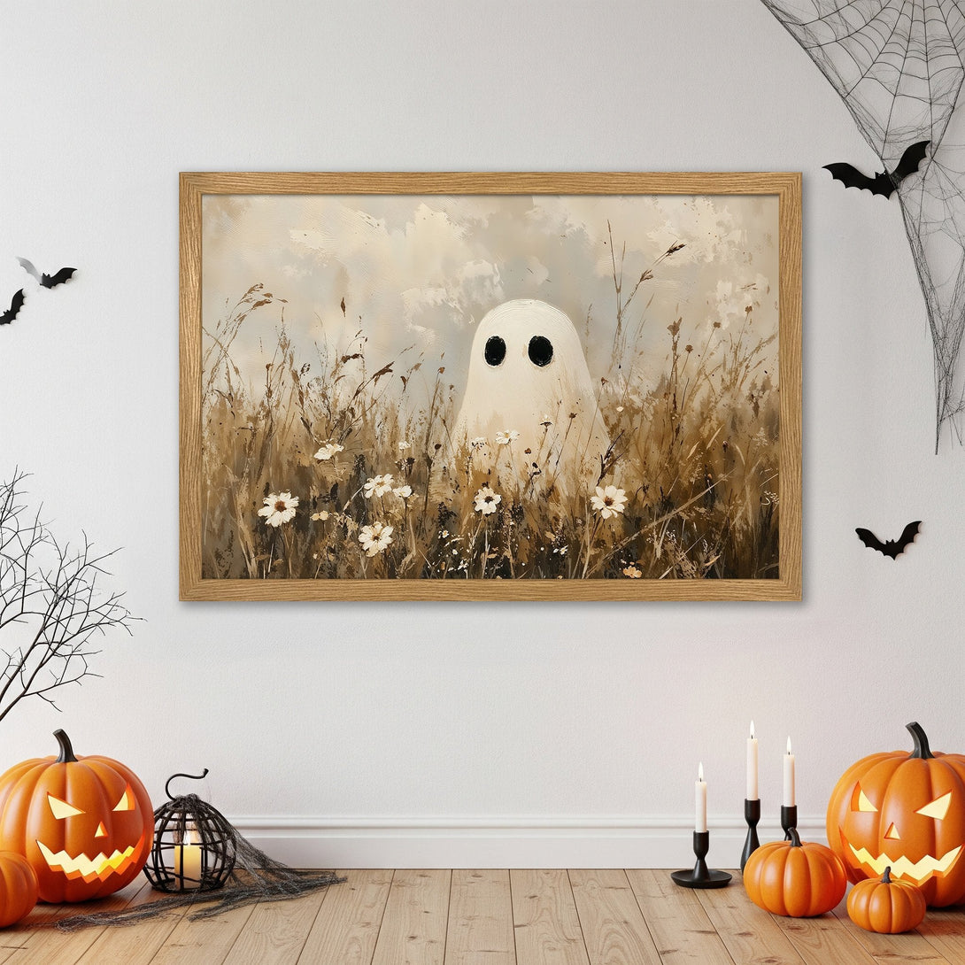 Framed Poster featuring a whimsical ghost in a field, painted in a neutral, earthy color palette. Perfect Halloween decor!