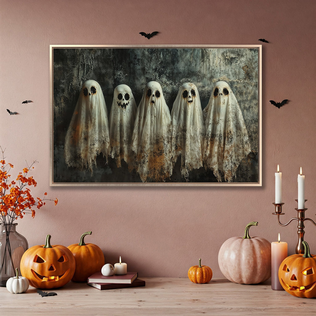 Framed Wall Art: Spooky ghost print in a Halloween-themed interior. Features a dark, moody color palette with orange and beige accents. Perfect for Halloween decor!