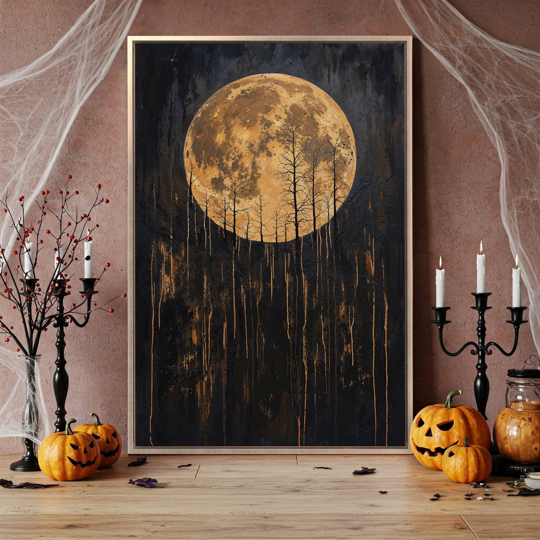 Framed Wall Art featuring a spooky moonlit forest scene in black and gold. Perfect Halloween decor, adding a touch of mystery to your space.